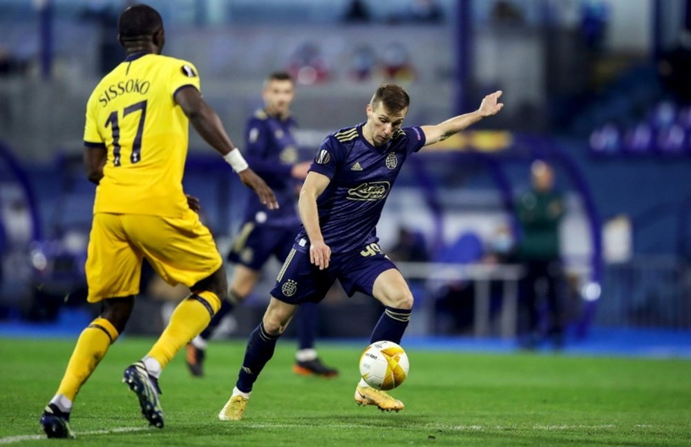 Mislav Orsic marcou os três gols da eliminação do Tottenham. AFP