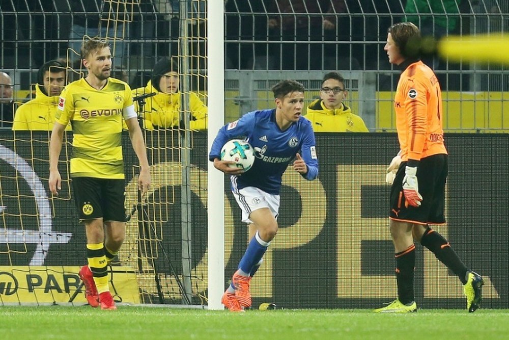 O Schalke 04 recebe o Dortmund. AFP
