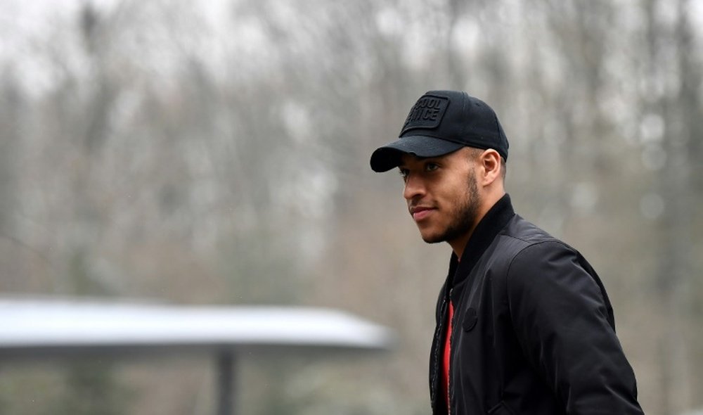 Corentin Tolisso arrive au centre national du football à Clairefontaine-en-Yvelines. AFP