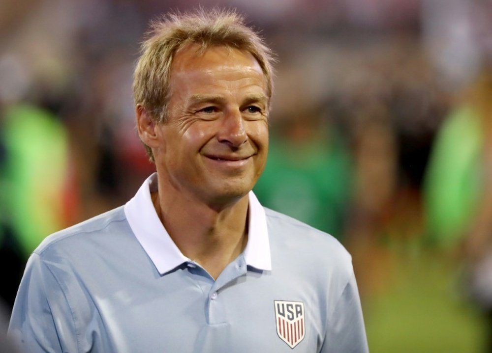 L'entraîneur des Etats-Unis sourit après la victoire face à Trinité et Tobago. AFP