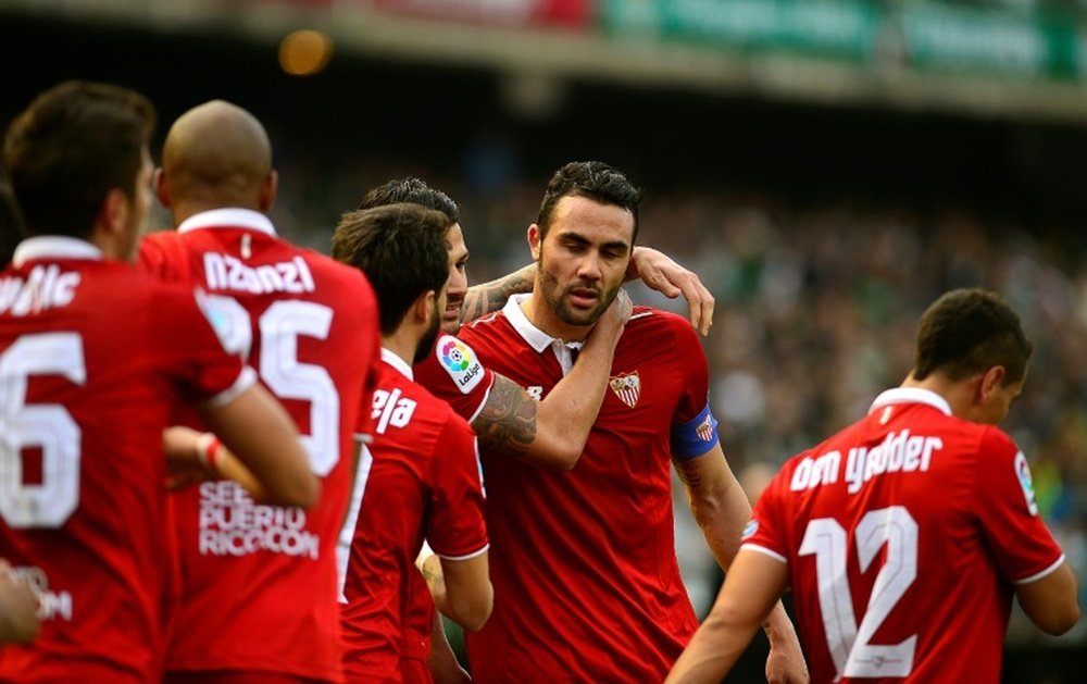 Le capitaine du FC Séville Vicente Iborra inscrit le but de la victoire face au Betis. AFP