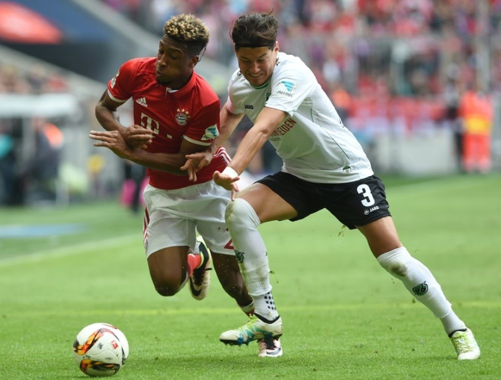 Le défenseur du Bayern, le Français Kingsley Coman à la lutte. AFP