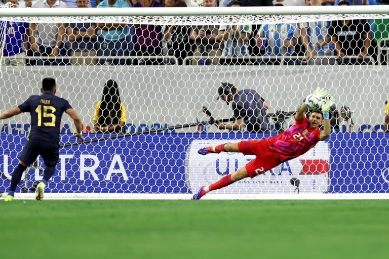 Emiliano Martinez slapped away a camera after Argentina's loss to Colombia. AFP