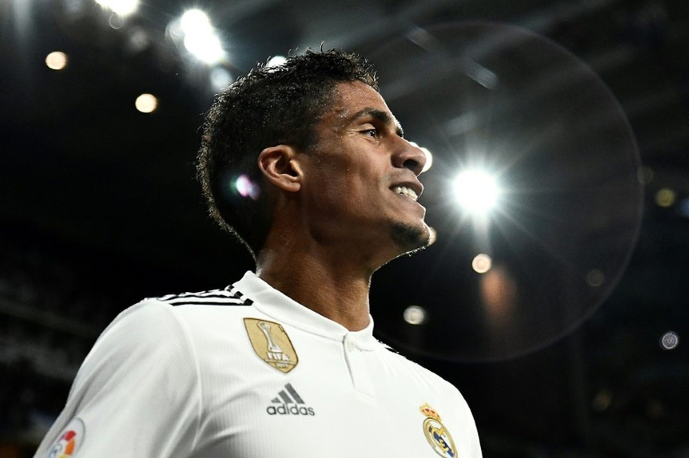 Varane announces he is staying at Real Madrid. AFP