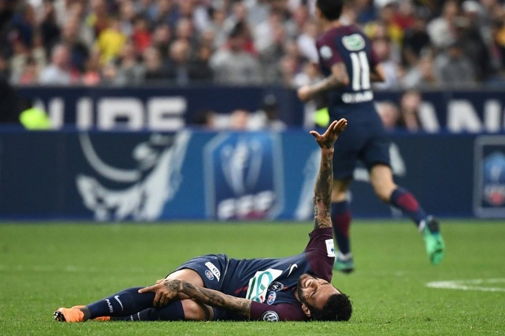 Alves picked up an injury in the French Cup final. AFP