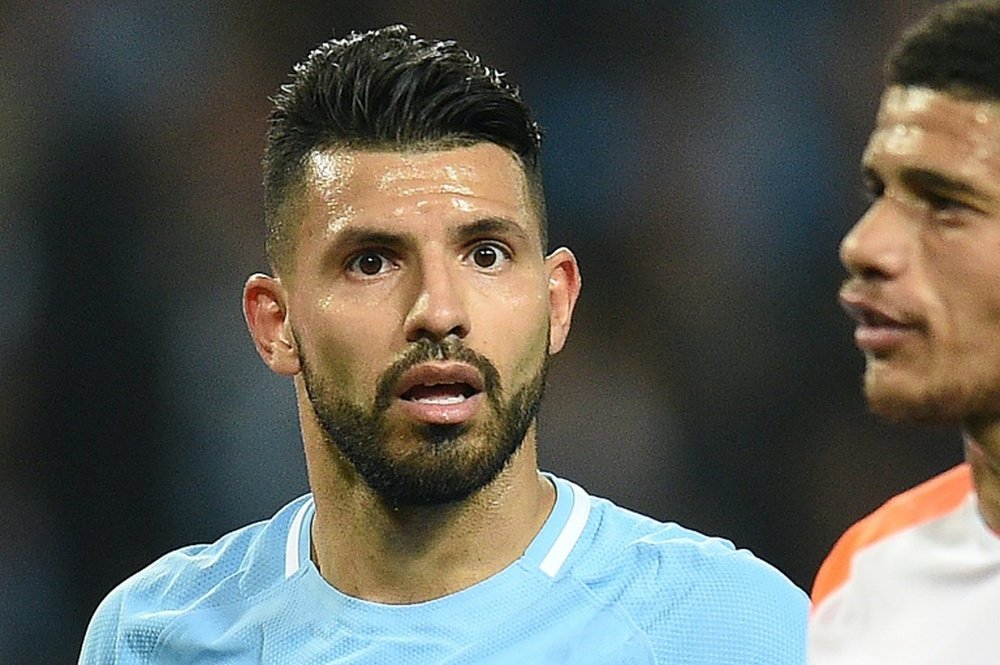 Aguero is the subject of interest from AC Milan. AFP