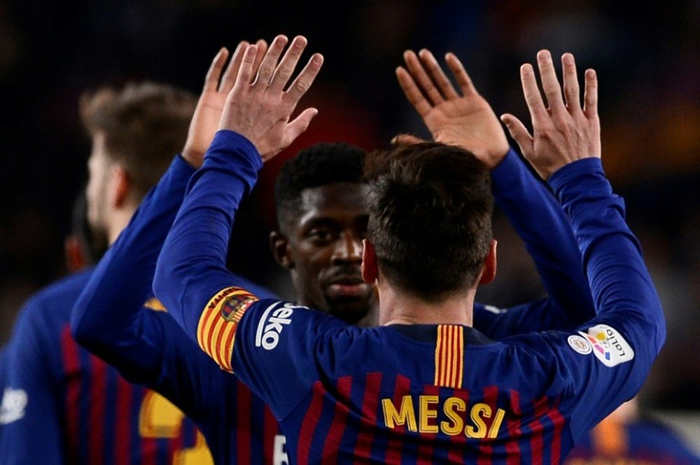 Lionel Messi e Ousmane Dembélé, titulares confirmados do Barcelona. AFP