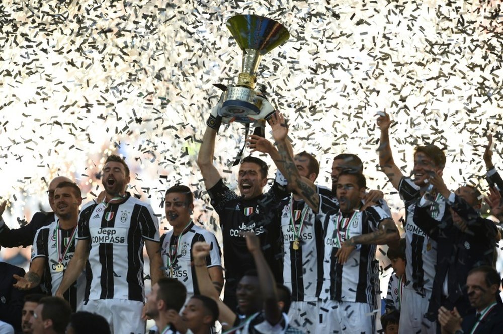 Les joueurs de la Juventus en liesse après avoir remporté le titre de champion d'Italie. AFP