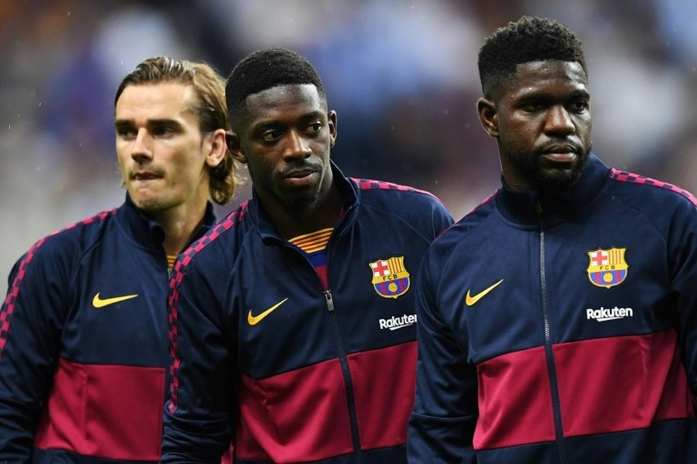 El Barça se pronuncia sobre la polémica racista de Griezmann y Dembélé. AFP