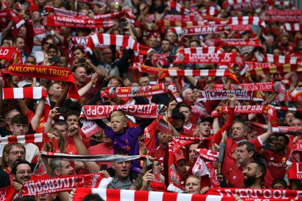 Les supporters de Liverpool, insatisfaits des excuses de John Henry. AFP
