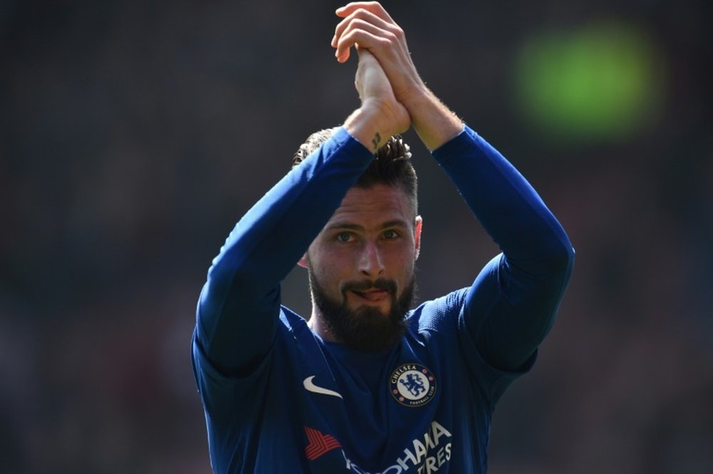 Giroud believes Chelsea will fight to the very end. AFP