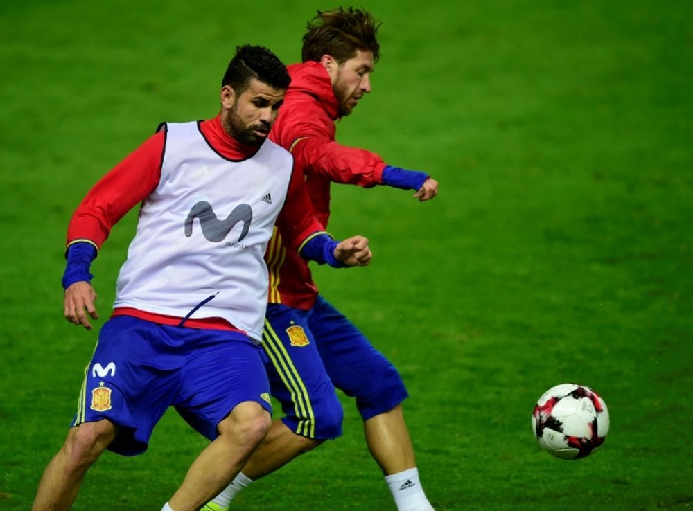 Sergio Ramos y Diego Costa están en sintonía cuando juegan con España. AFP/Archivo