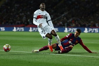 Joao Cancelo committed a penalty on Ousmane Dembele. AFP