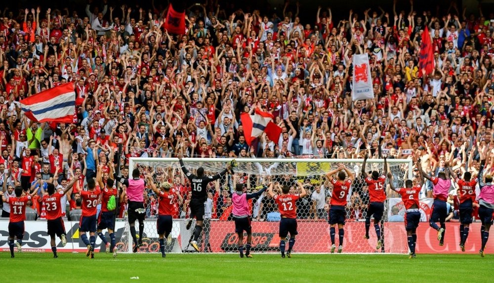 Festejos dos jogadores do Lille, após goleada sobre o Nantes. AFP