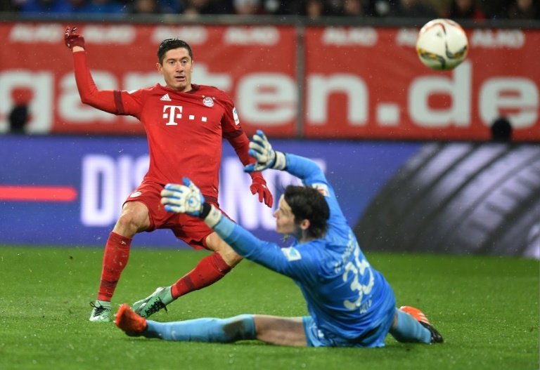 Lewandowski scoring past Hitz in 2016. He scored another two past him on Saturday. AFP