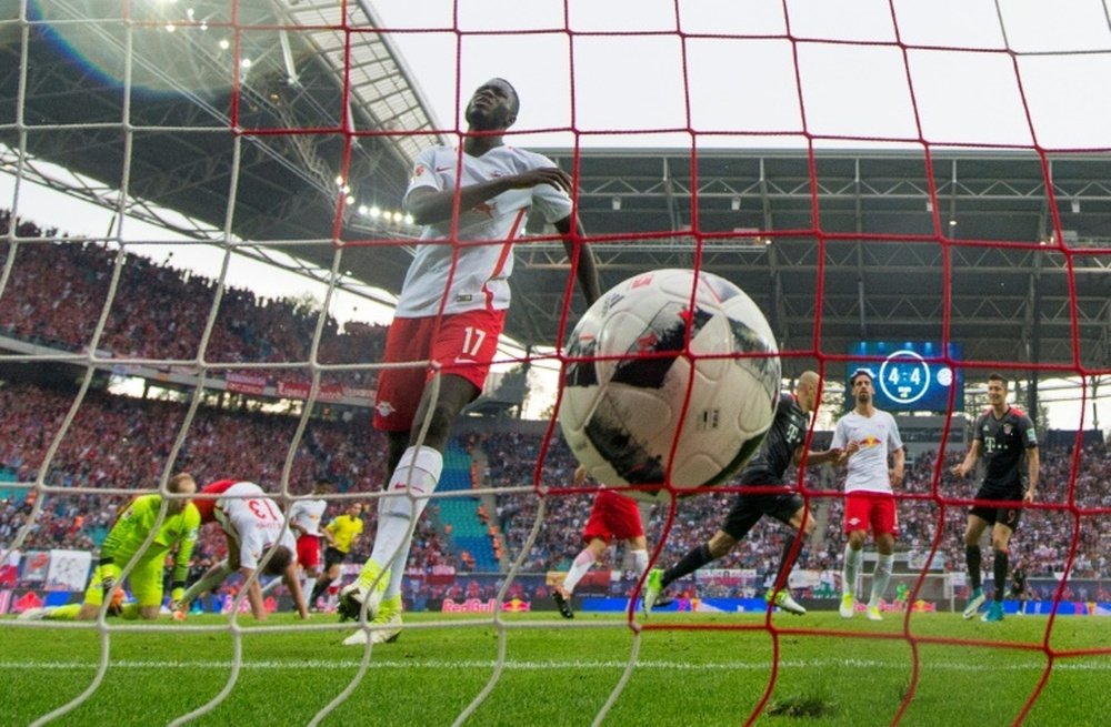 Robben hits Bayern's winner in nine-goal thriller. AFP