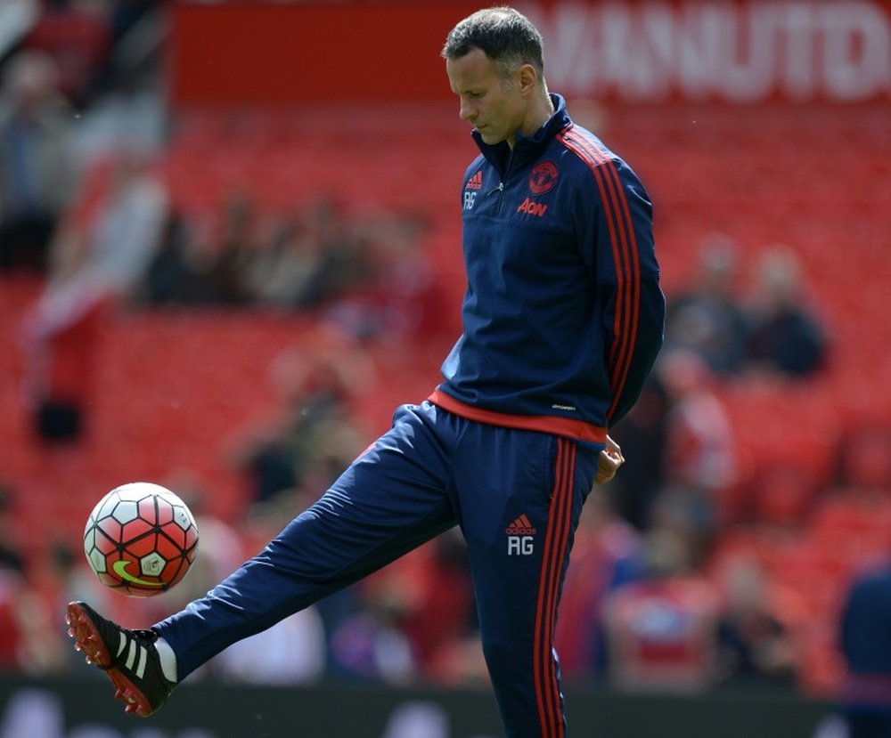 Ryan Giggs doesn't want to hurry up. AFP