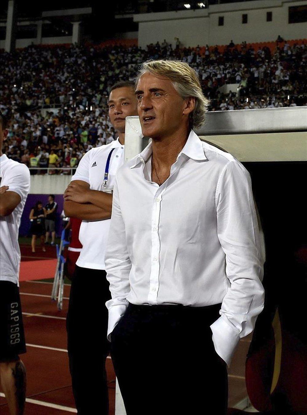 El entrenador del Inter de Milán Roberto Mancini durante el partido amistoso ante el Real Madrid disputado en Guangzhou, China hoy 27 de julio de 2015. El Real Madrid se impuso por 3-0. EFE