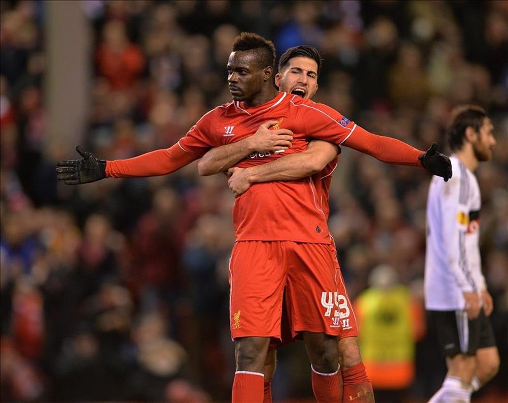Balotelli is congratulated by Emre Can after scoring a rare Liverpool goal. EFE