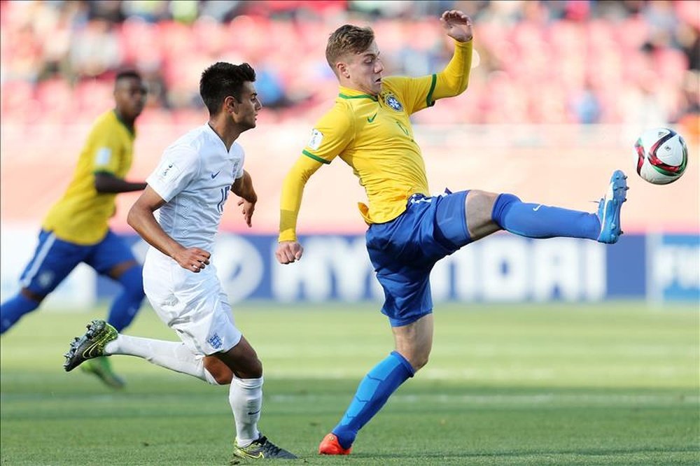 Easah Suliman and Luis Henrique. AFP