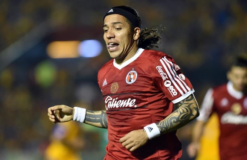 Dayro Moreno de Tijuana celebra la anotación de un gol ayer, sábado 13 de febrero de 2016, durante el partido correspondiente a la jornada 6 del torneo clausura 2016 celebrado en el estadio Universitario de la ciudad de Monterrey (México). EFE
