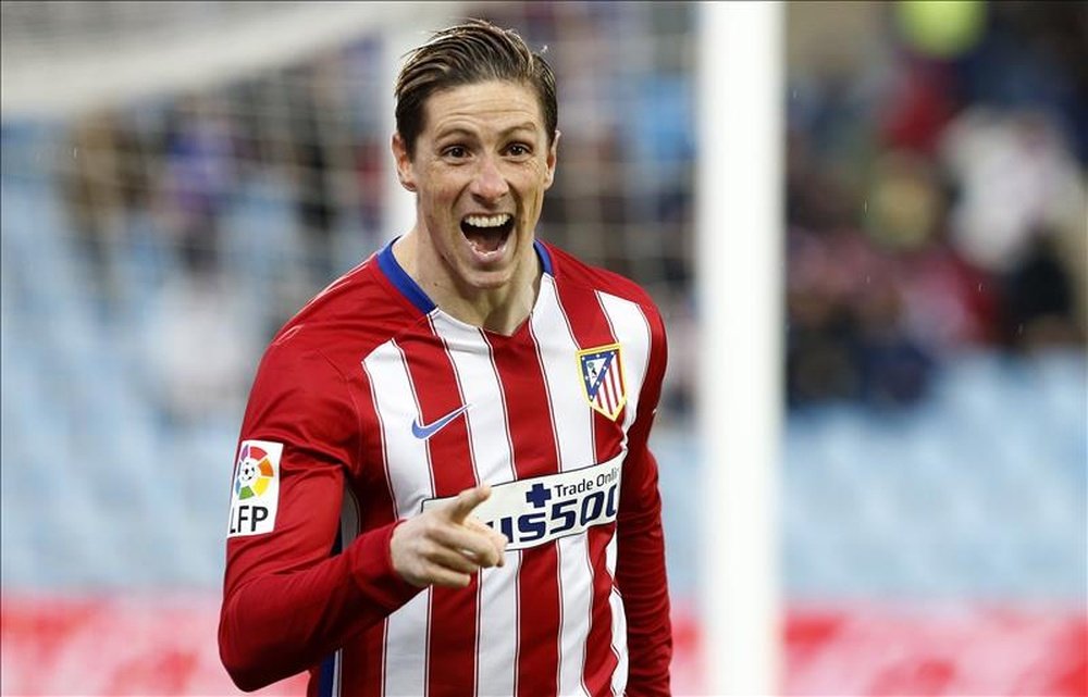 El delantero del Atlético de Madrid Fernando Torres celebra el primer gol de su equipo ante el Getafe, en partido de la vigésima cuarta jornada de liga en Primera División que se disputó en el Coliseo Alfonso Pérez. EFE