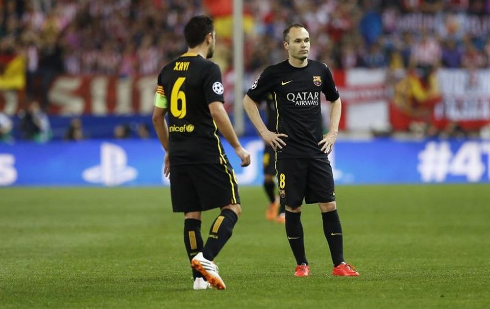 Iniesta and Xavi, similar in their farewells. EFE/Archivo