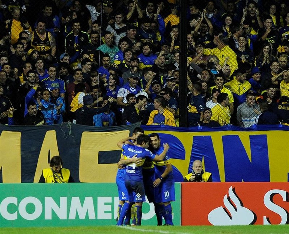 Carlos Tevez celebrates a goal for Boca Juniors against Deportivo Cali. EFE