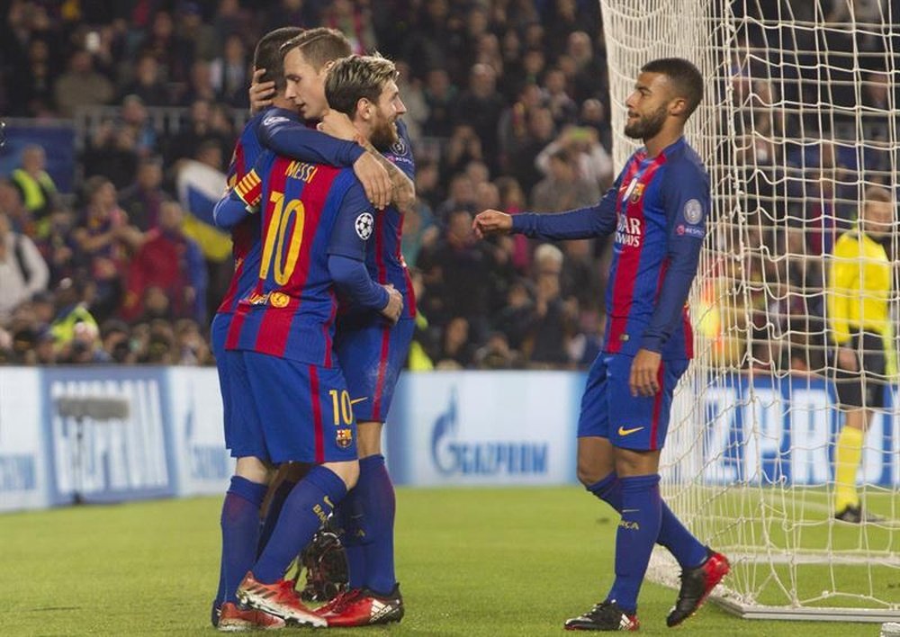 Barcelona players celebrating a goal. AFP