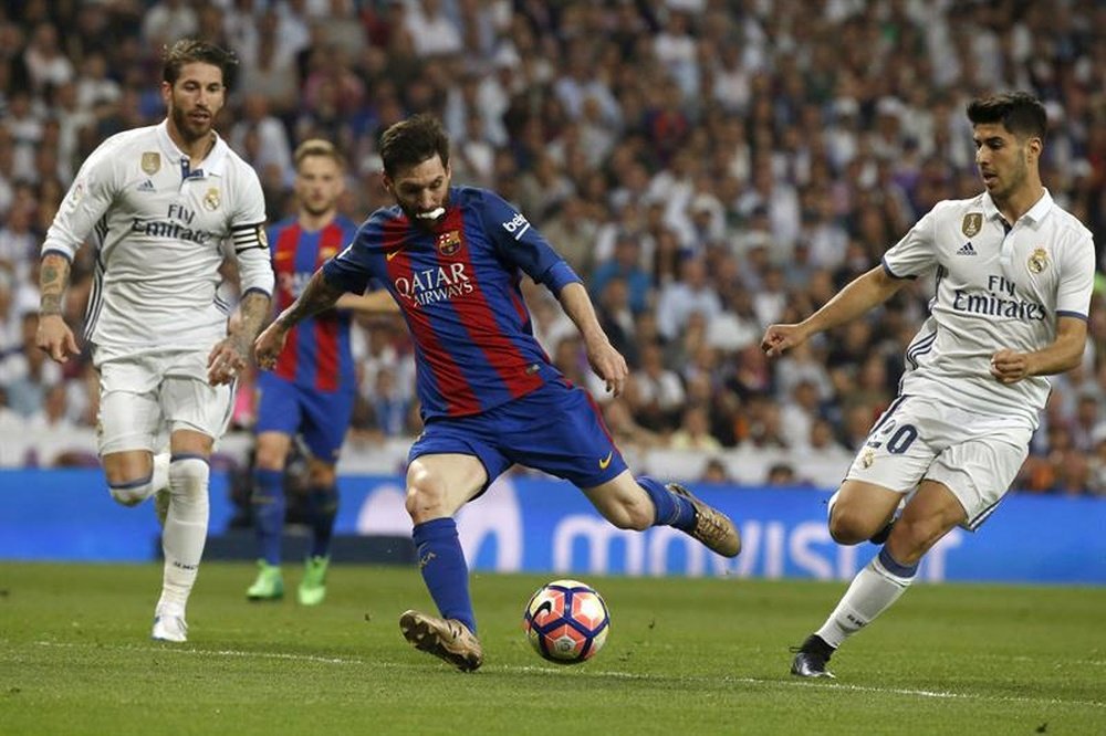 Messi hits Barca 500 with last gasp El Clasico winner. EFE
