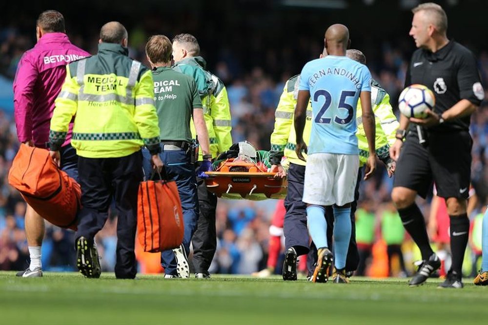 Ederson was stretchered off after his clash with Mane. EFE/EPA