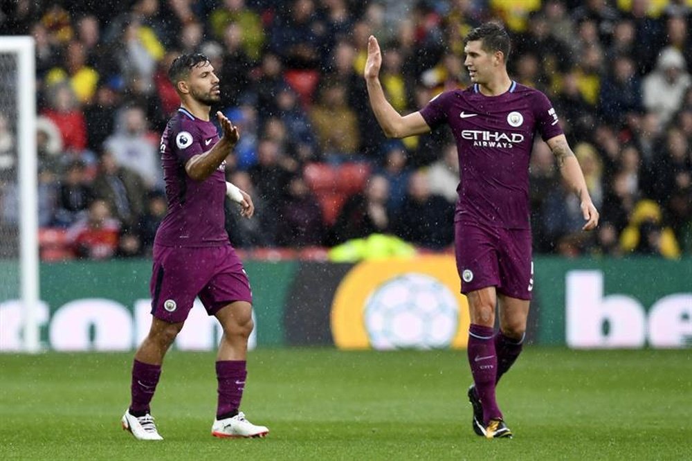 Aguero celebrates with Stones after scoring against Watford on Saturday. EFE/EPA