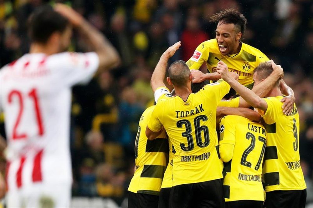 Dortmund thrashed Cologne 5-0 to go top of Bundesliga. AFP