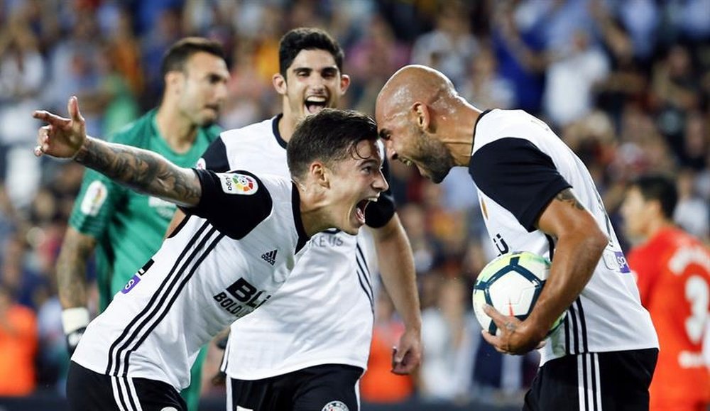Zaza hat-trick fires five-star Valencia into third. EFE