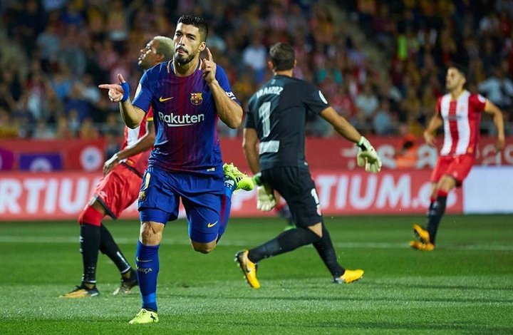 Barca ease to victory in Catalan derby