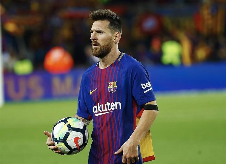 Messi 'apanha' Puyol no Barcelona