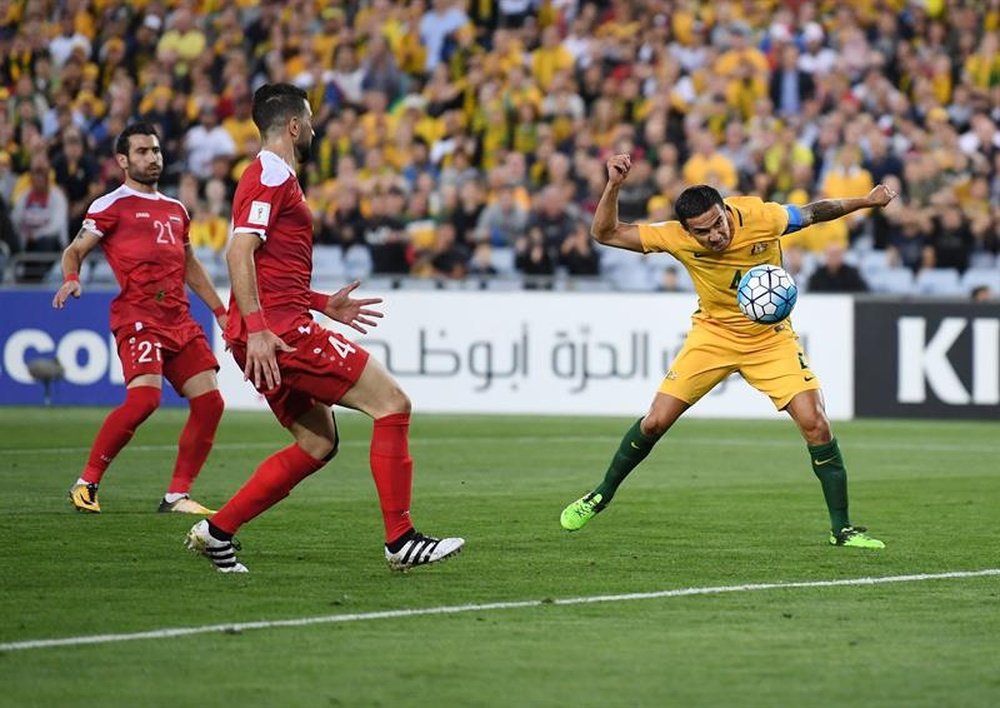 Cahill's 50th goal for his country sealed their place in the inter-continental play-off. AFP