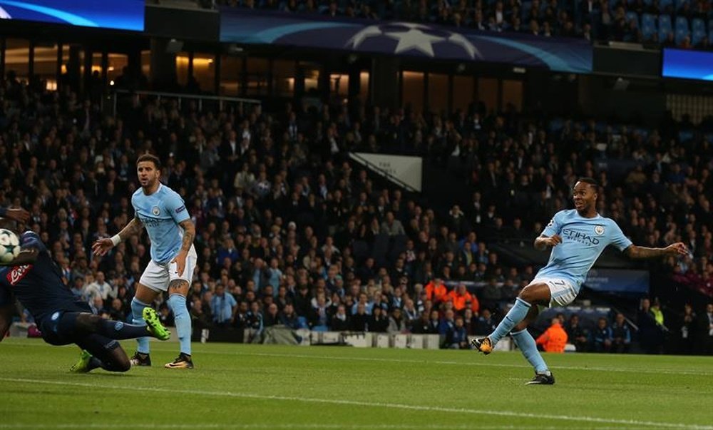 Sterling scores the opener for City. AFP