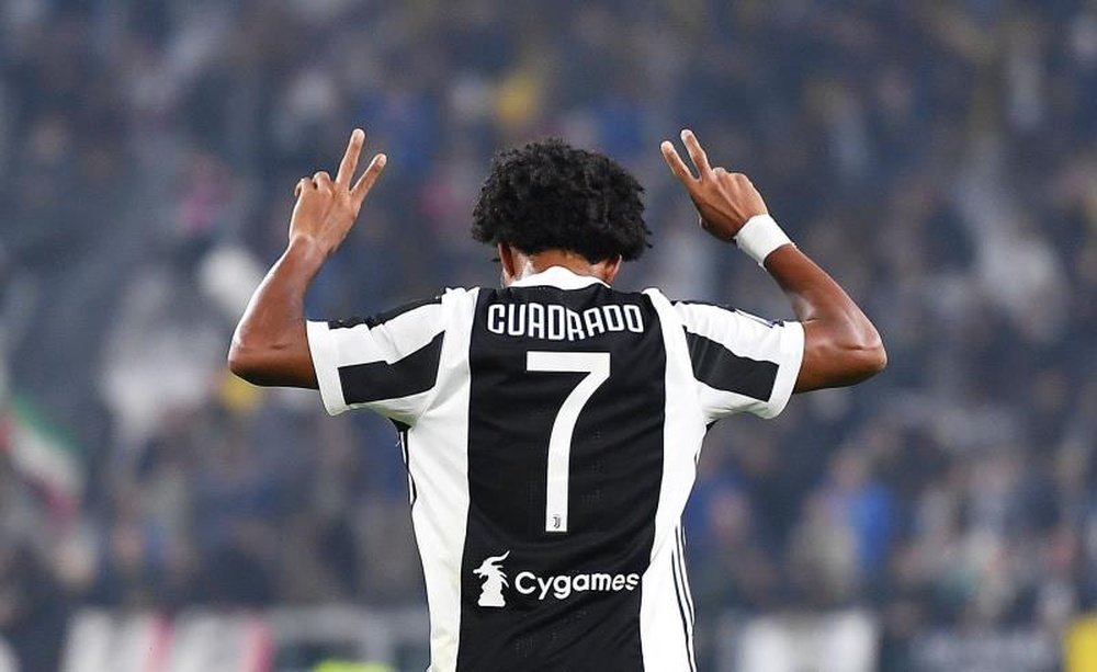 Juventus winger Cuadrado out for another month after groin surgery. EFE