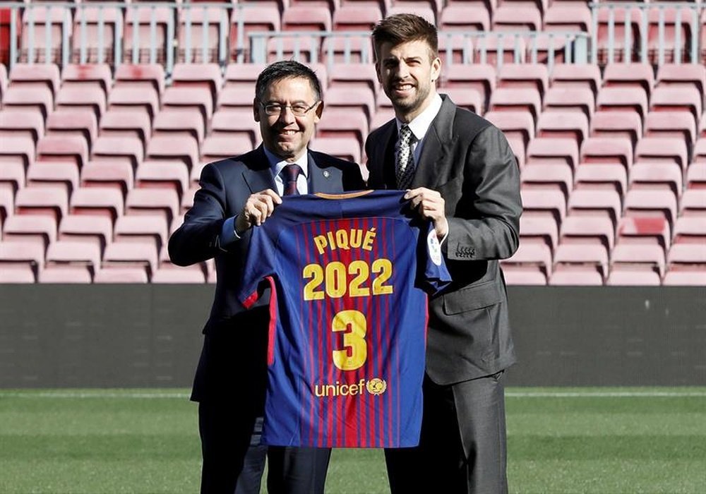 Piqué e Bartomeu resolvem diferenças. EFE