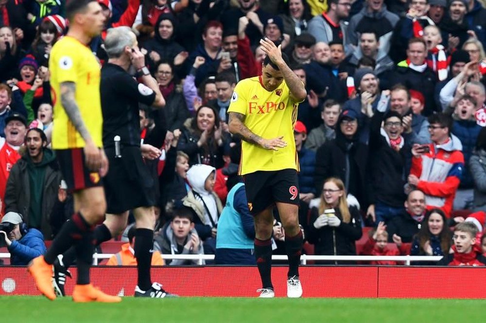 Deeney could have got Watford back in the game. AFP