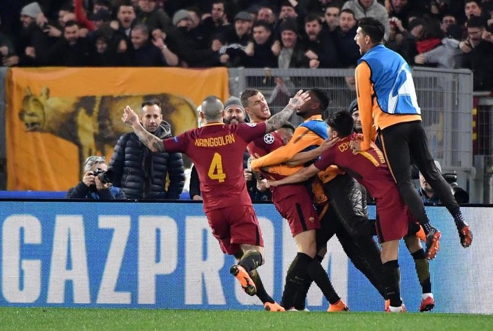 Dzeko's goal handed Roma a place in the last eight. AFP