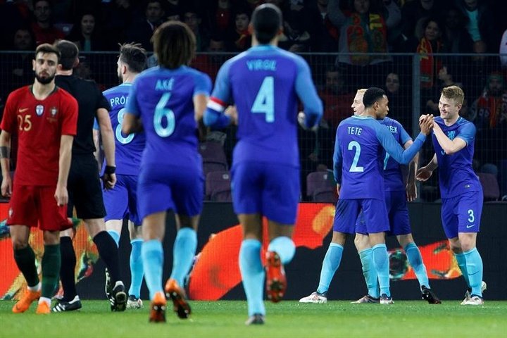 Koeman's Holland ease to convincing victory over Portugal