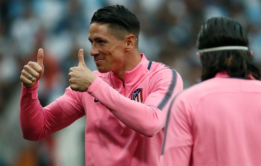 Torres se irá del Atlético con el título más especial de su vida. AFP
