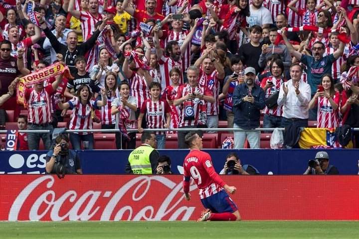 Torres brace secures Atletico a point in farewell appearance