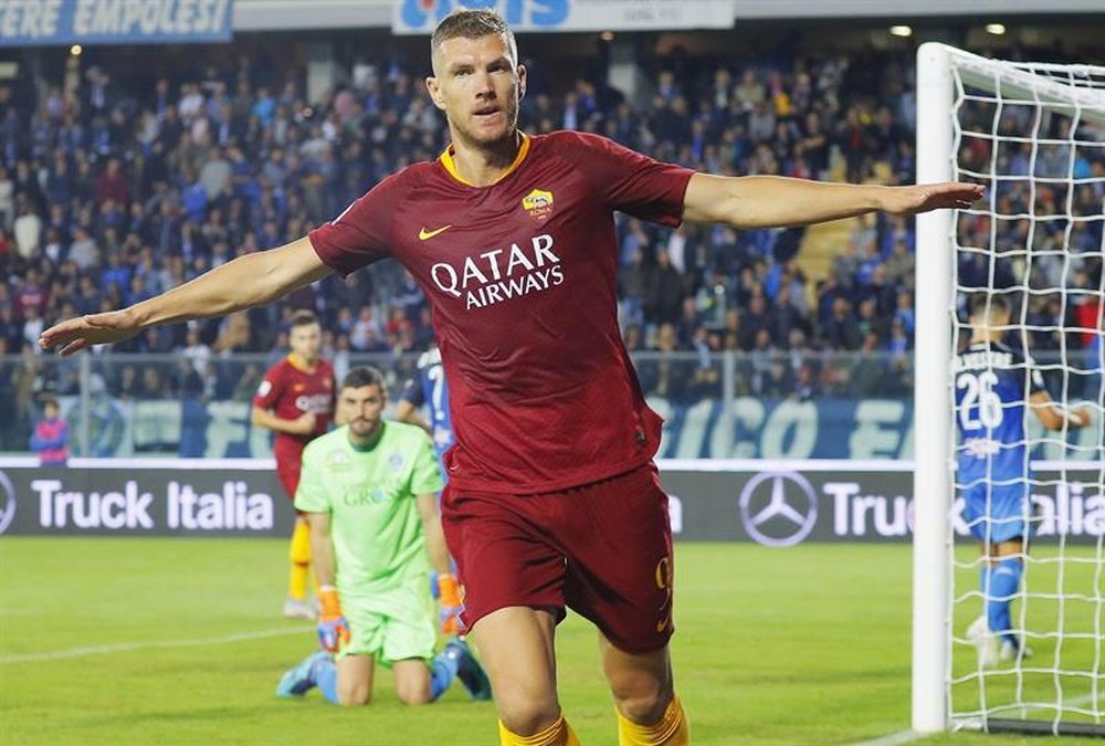 Dzeko is linked with a move away from Roma. EFE