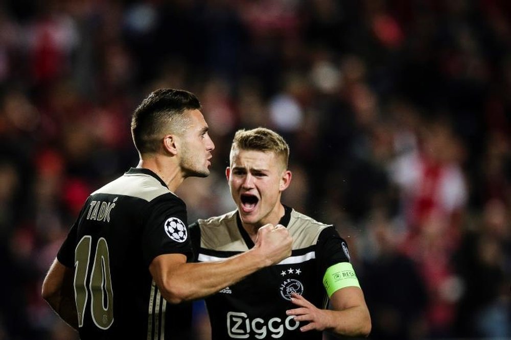 Tadic scored a beautiful curler to tighten Ajax's grip. EFE