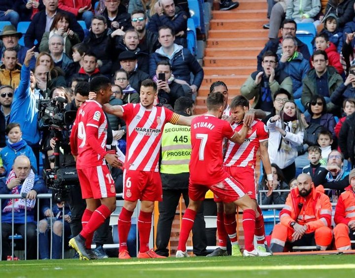 Girona claim three points from 10 men Madrid