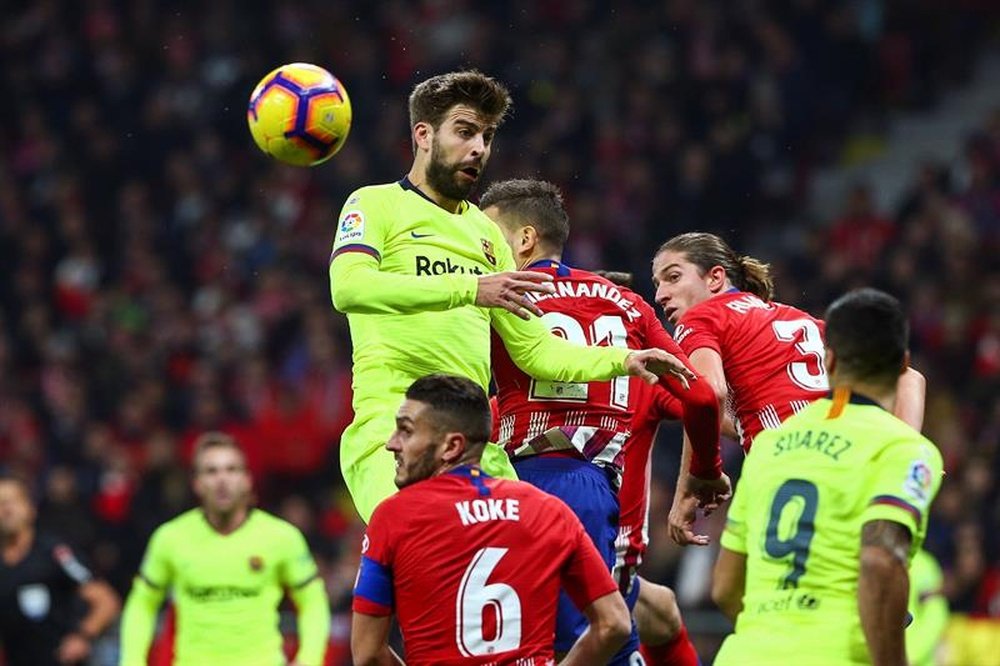 Provavéis escalações de Atlético de Madrid e Barcelona. AFP