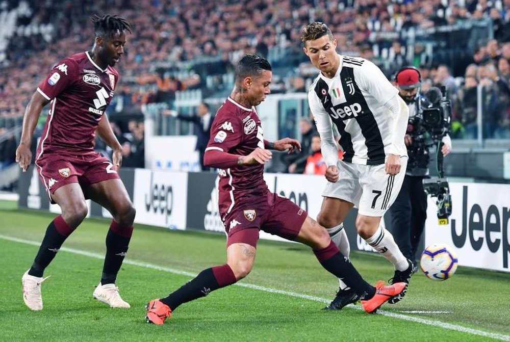 Torino want 15 million euros for Izzo (C). AFP